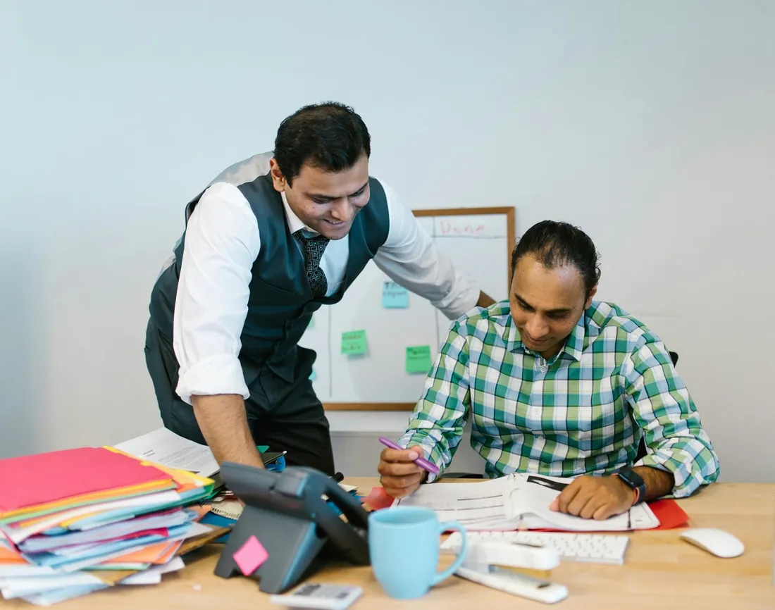 Financial advisor helping a customer with loan documents